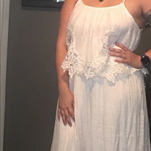 White dress with lace detail.  Brand new